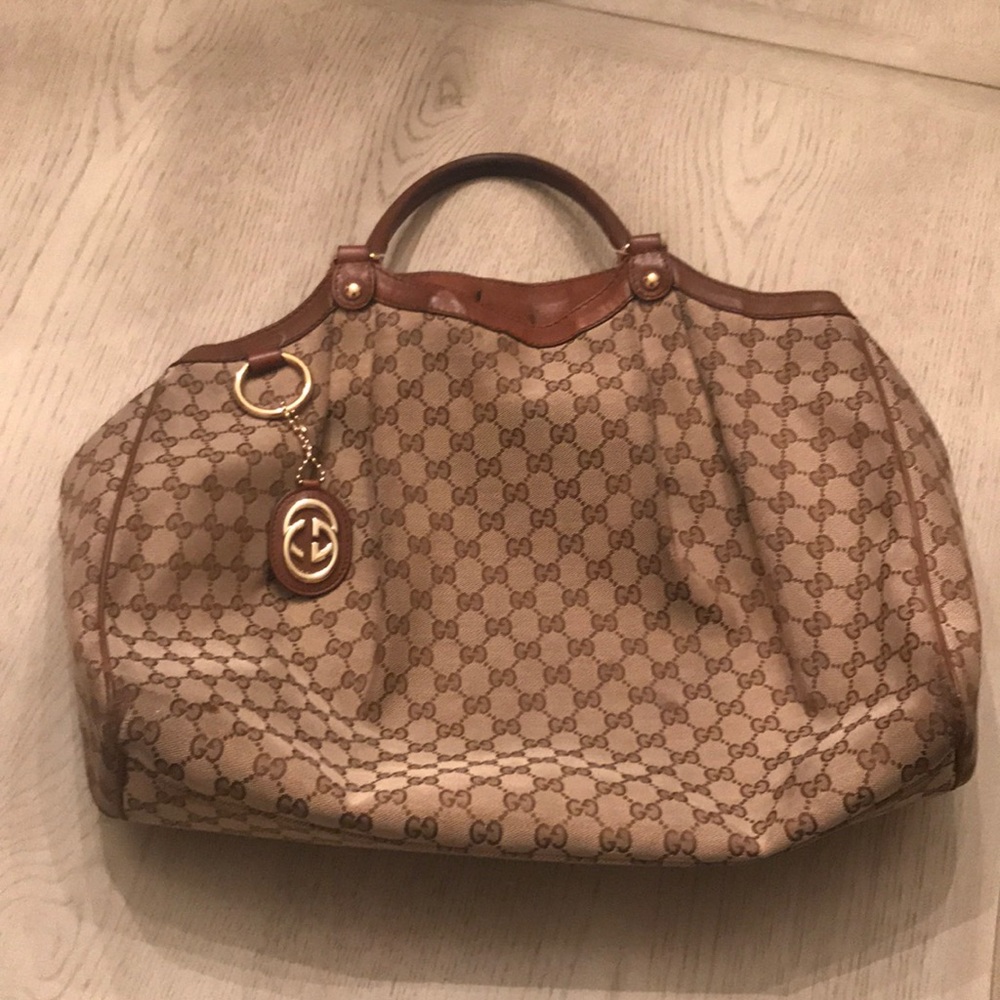 Authentic Gucci Brown Canvas Sukey